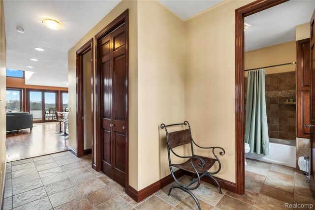 11589 Ember, Davisburg, MI 48350 - corridor with baseboards and recessed lighting