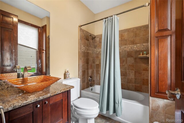 11589 Ember, Davisburg, MI 48350 - bathroom featuring vanity, shower / bathtub combination with curtain, and toilet