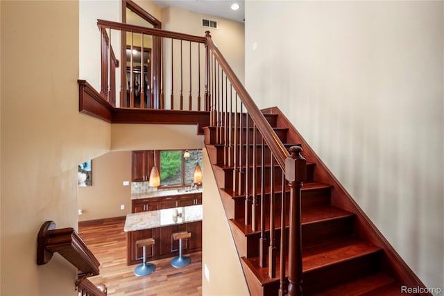 11589 Ember, Davisburg, MI 48350 - stairway featuring wood finished floors, baseboards, and recessed lighting