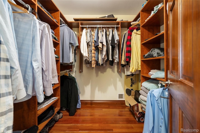 11589 Ember, Davisburg, MI 48350 - walk in closet with wood finished floors