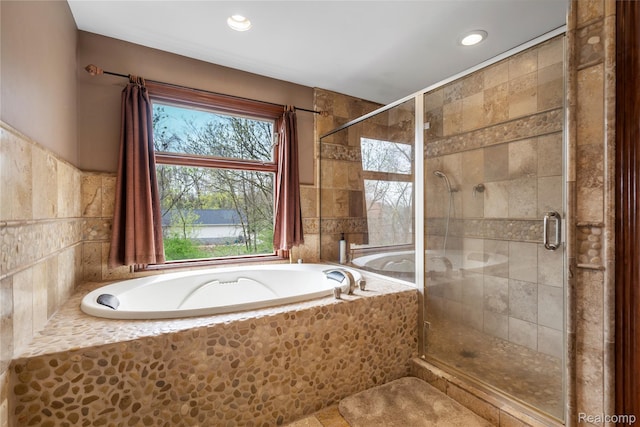 11589 Ember, Davisburg, MI 48350 - bathroom featuring a bath, a stall shower, and recessed lighting