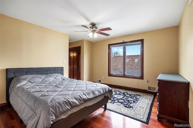 11589 Ember, Davisburg, MI 48350 - bedroom featuring wood finished floors, baseboards, and ceiling fan