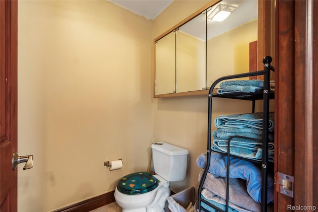 11589 Ember, Davisburg, MI 48350 - bathroom with toilet and baseboards