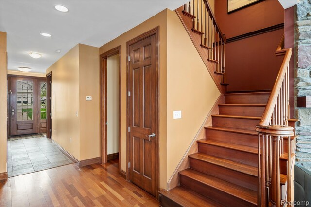 11589 Ember, Davisburg, MI 48350 - stairway with wood finished floors, baseboards, and recessed lighting