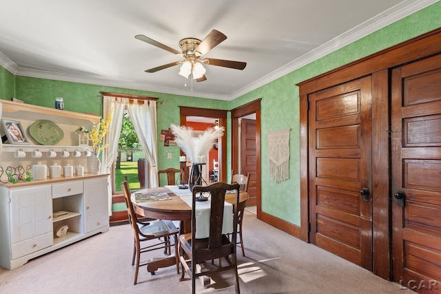 134 W Lagrange St, Morenci, MI 49256 - dining room with light colored carpet, ceiling fan, ornamental molding, and baseboards
