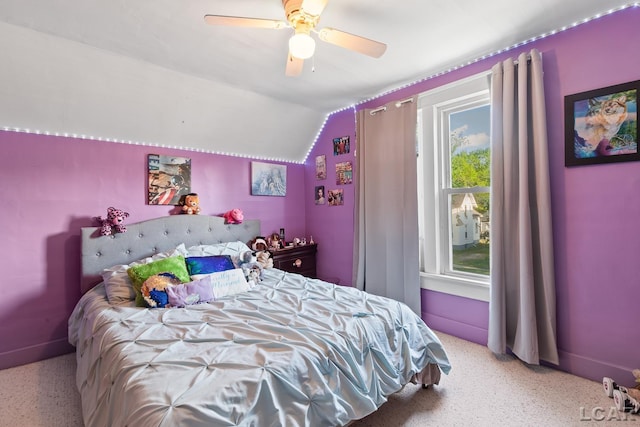 134 W Lagrange St, Morenci, MI 49256 - bedroom with vaulted ceiling, baseboards, speckle patterned floor, and a ceiling fan
