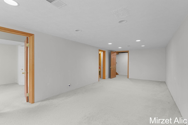 1145 Eastmont Dr SE, Grand Rapids, MI 49546 - empty room featuring light carpet and recessed lighting