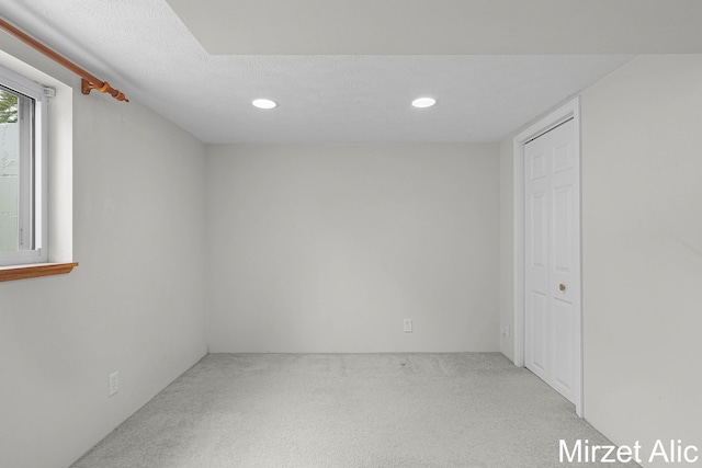1145 Eastmont Dr SE, Grand Rapids, MI 49546 - unfurnished room with carpet flooring and recessed lighting