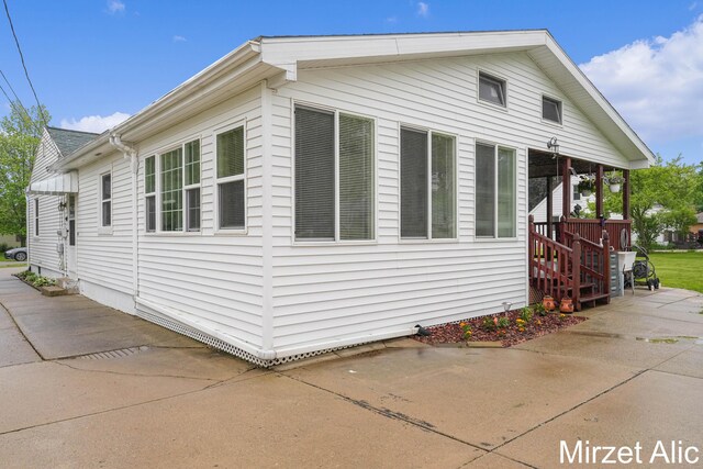 1145 Eastmont Dr SE, Grand Rapids, MI 49546 - view of home's exterior featuring a patio
