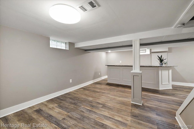 2376 Bacon Ave, Berkley, MI 48072 - below grade area featuring bar area, dark wood finished floors, and baseboards