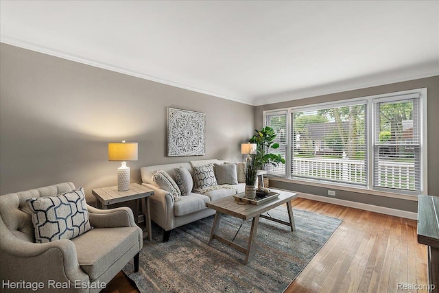2376 Bacon Ave, Berkley, MI 48072 - living area featuring ornamental molding, hardwood / wood-style flooring, and baseboards