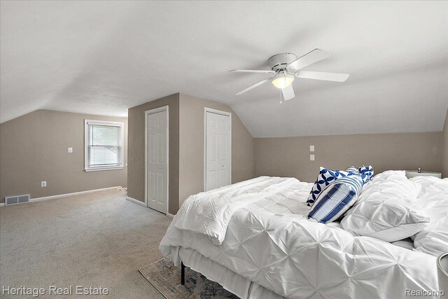 2376 Bacon Ave, Berkley, MI 48072 - bedroom with vaulted ceiling, multiple closets, baseboards, light colored carpet, and ceiling fan