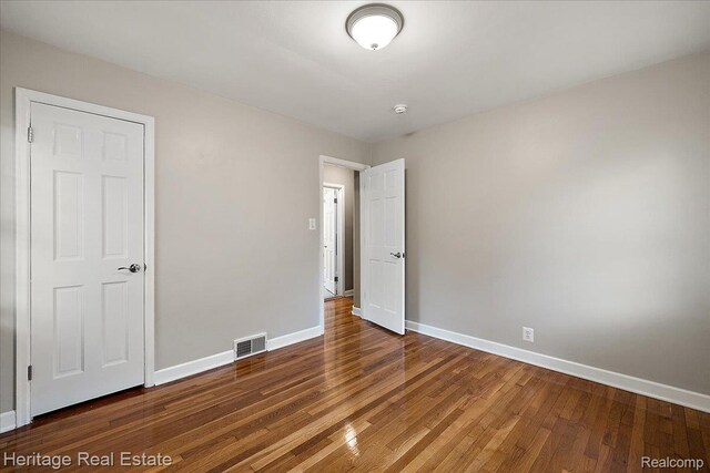 2376 Bacon Ave, Berkley, MI 48072 - unfurnished bedroom featuring baseboards and wood finished floors