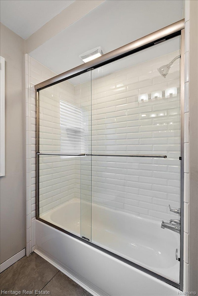 2376 Bacon Ave, Berkley, MI 48072 - full bath featuring combined bath / shower with glass door and baseboards
