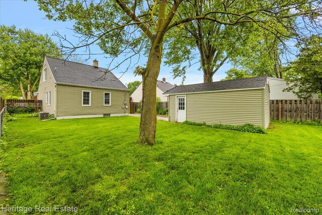 2376 Bacon Ave, Berkley, MI 48072 - view of yard featuring an outbuilding and central AC