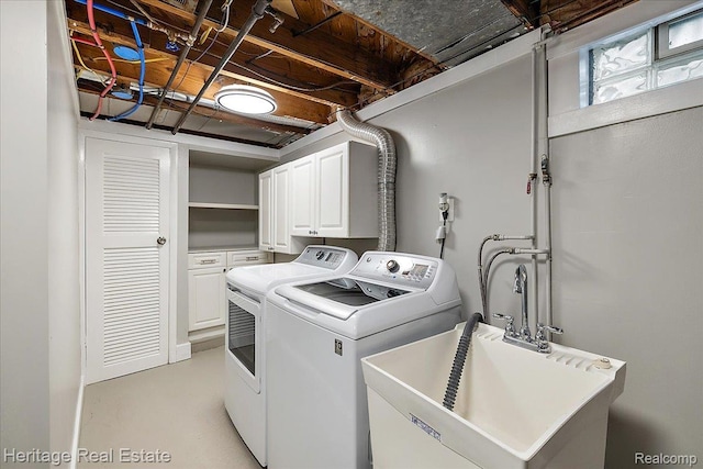 2376 Bacon Ave, Berkley, MI 48072 - laundry area featuring cabinet space and washer and dryer