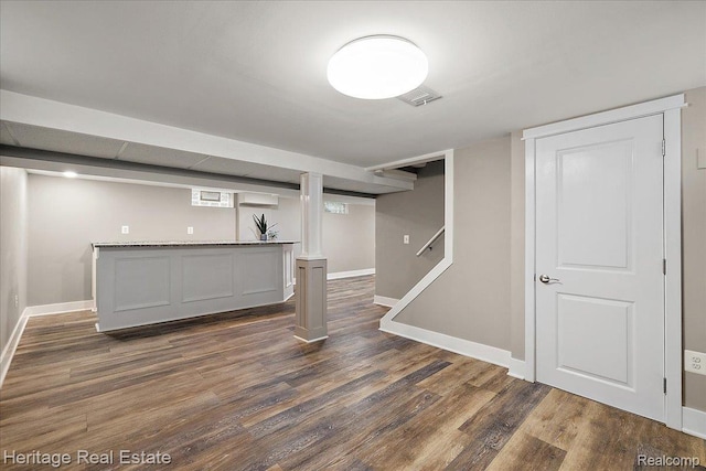 2376 Bacon Ave, Berkley, MI 48072 - finished below grade area with dark wood-type flooring and baseboards