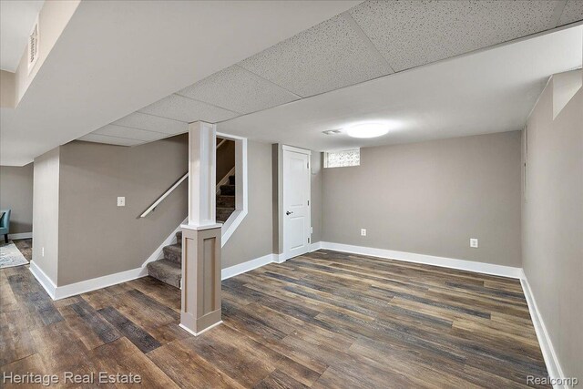 2376 Bacon Ave, Berkley, MI 48072 - below grade area with stairs, wood finished floors, baseboards, and a drop ceiling
