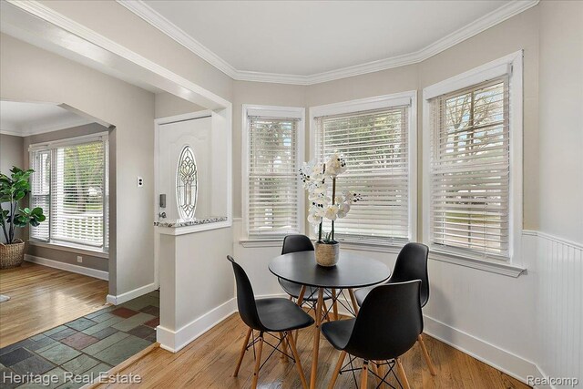 2376 Bacon Ave, Berkley, MI 48072 - dining area featuring crown molding, baseboards, and wood finished floors