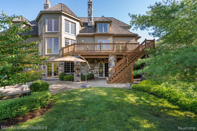 2921 Turtle Pond Ct, Bloomfield Hills, MI 48302 - rear view of house featuring french doors, a deck, a chimney, a yard, and stairway