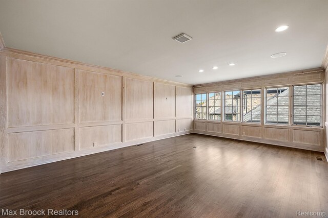 2921 Turtle Pond Ct, Bloomfield Hills, MI 48302 - empty room with a decorative wall, dark wood-type flooring, recessed lighting, and ornamental molding