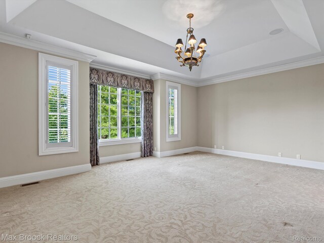 2921 Turtle Pond Ct, Bloomfield Hills, MI 48302 - carpeted spare room with a tray ceiling, a chandelier, baseboards, and ornamental molding