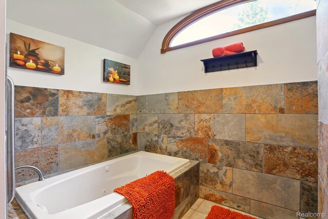 5960 Kidder Rd, Almont, MI 48003 - full bath with lofted ceiling and a tub with jets