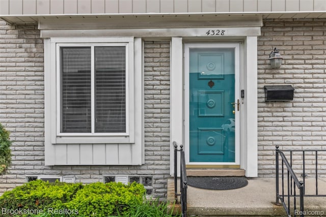 4328 15 Mile Rd, Sterling Heights, MI 48310 - entrance to property with brick siding