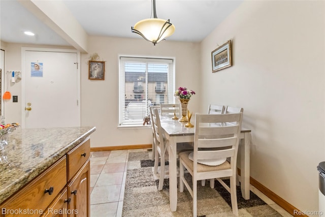 4328 15 Mile Rd, Sterling Heights, MI 48310 - dining space with baseboards and light tile patterned floors