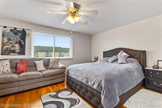 4328 15 Mile Rd, Sterling Heights, MI 48310 - bedroom with wood finished floors and ceiling fan
