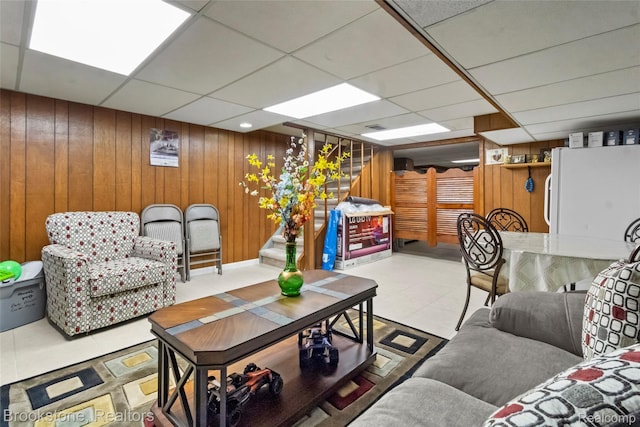 4328 15 Mile Rd, Sterling Heights, MI 48310 - living room with wooden walls, a paneled ceiling, and stairway