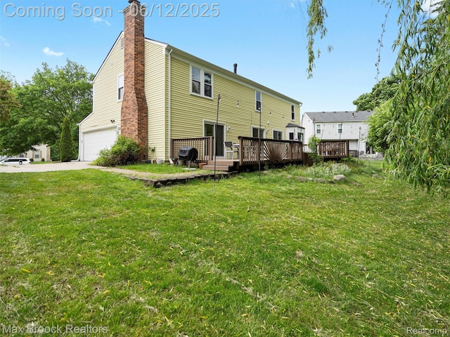 5544 Kingsfield Dr, West Bloomfield, MI 48322 - rear view of property with a chimney, a garage, a deck, a yard, and concrete driveway