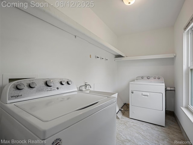 5544 Kingsfield Dr, West Bloomfield, MI 48322 - washroom with washing machine and dryer and healthy amount of natural light