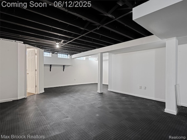 5544 Kingsfield Dr, West Bloomfield, MI 48322 - basement with baseboards and dark colored carpet
