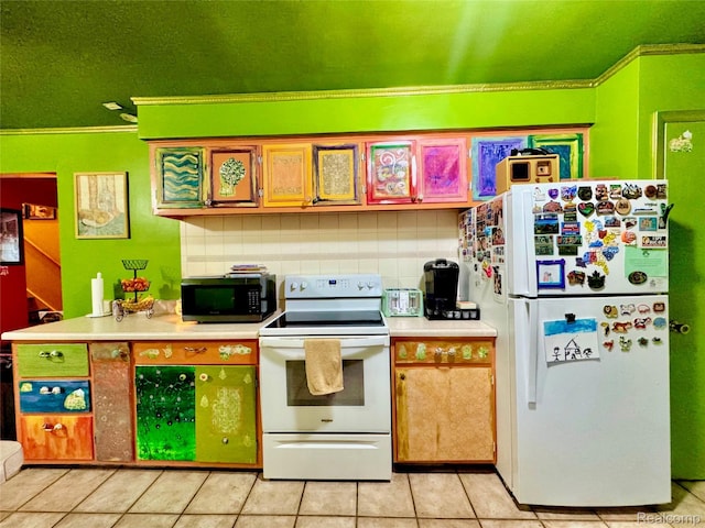 219 W Butler St, Bad Axe, MI 48413 - kitchen with white appliances, crown molding, light tile patterned flooring, light countertops, and tasteful backsplash