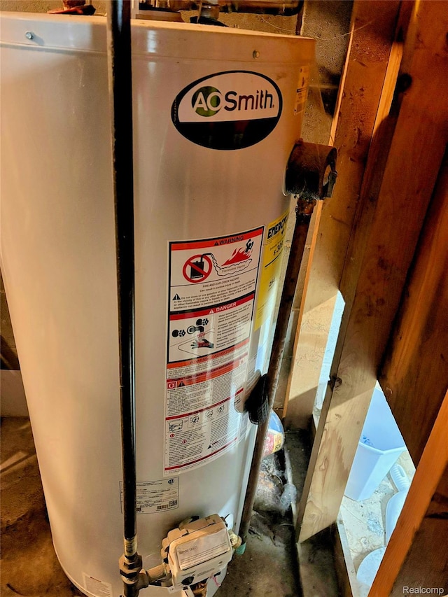 219 W Butler St, Bad Axe, MI 48413 - detailed view of water heater and concrete floors
