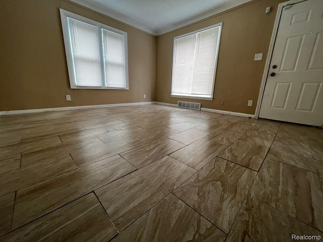 8260 Coyle St, Detroit, MI 48228 - empty room featuring ornamental molding and baseboards