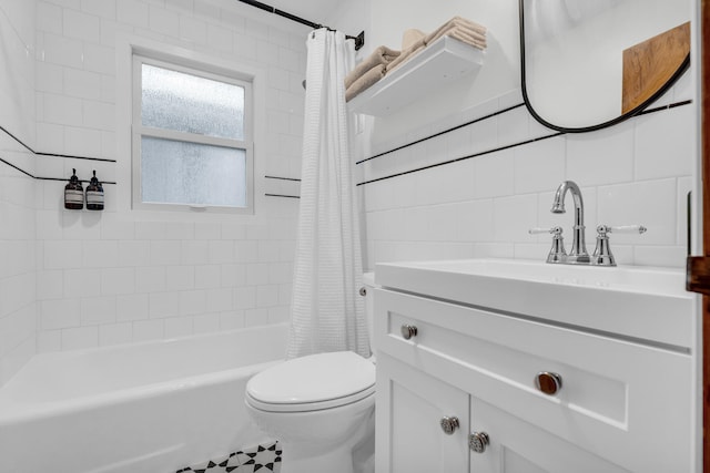 5810 N Lakeshore Rd, Deckerville, MI 48427 - bathroom with vanity, shower / bath combination with curtain, toilet, tile walls, and tasteful backsplash