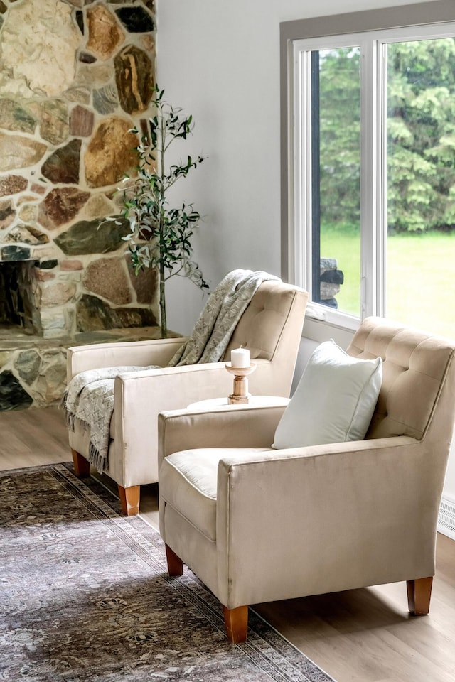 5853 W 112th St, Grant, MI 49327 - sitting room with wood finished floors and plenty of natural light