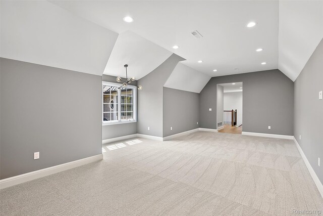 3268 Willis Dr, Oakland, MI 48306 - additional living space with vaulted ceiling, light colored carpet, baseboards, and recessed lighting
