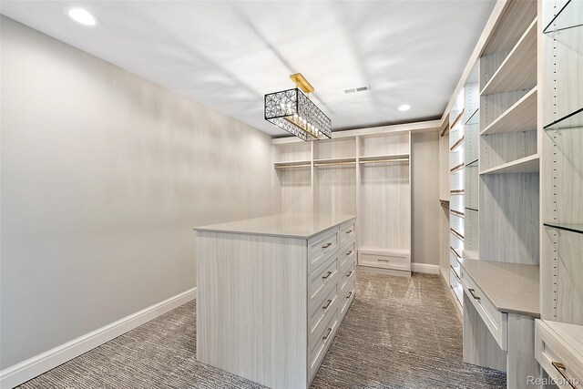 3268 Willis Dr, Oakland, MI 48306 - walk in closet featuring dark carpet
