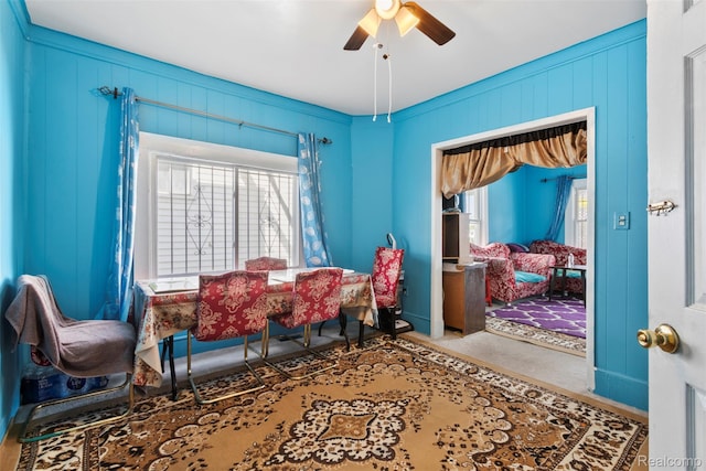 5151 Yemans St, Hamtramck, MI 48212 - dining room featuring a ceiling fan, healthy amount of natural light, a decorative wall, and carpet