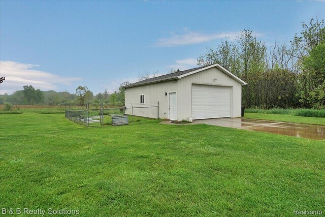 5951 English Rd, Silverwood, MI 48760 - detached garage with a garden
