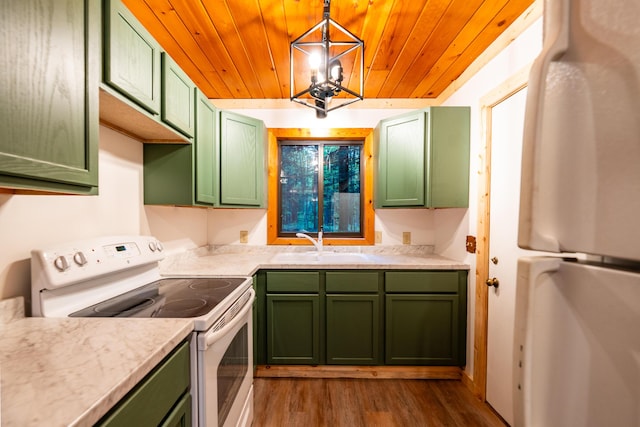 17341 Old Logging Rd, Hersey, MI 49639 - kitchen featuring green cabinets, white range with electric cooktop, a sink, freestanding refrigerator, and dark wood-type flooring