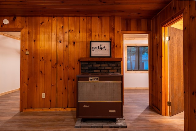 17341 Old Logging Rd, Hersey, MI 49639 - detailed view of wood finished floors, baseboards, wood ceiling, and wood walls