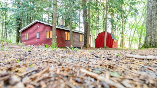 17341 Old Logging Rd, Hersey, MI 49639 - view of side of home