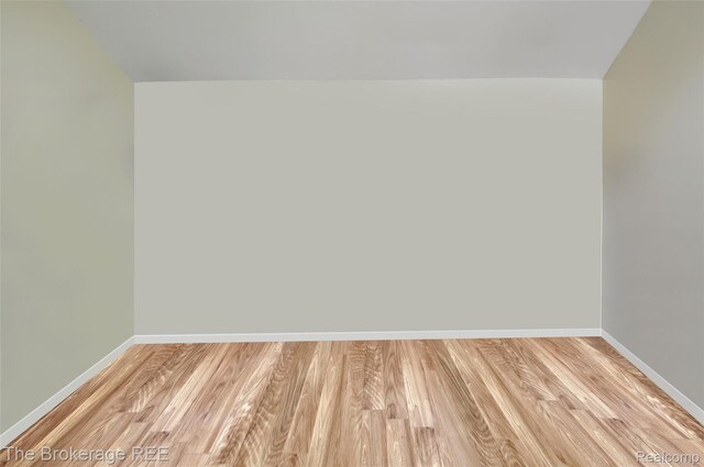 12445 Shaffer Rd, Davisburg, MI 48350 - additional living space with light wood finished floors and baseboards