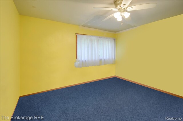 12445 Shaffer Rd, Davisburg, MI 48350 - carpeted empty room with ceiling fan and baseboards