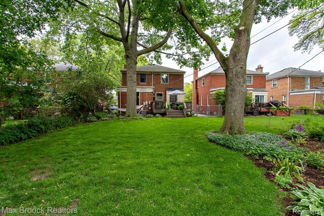 13317 Victoria Ave, Huntington Woods, MI 48070 - view of yard with a wooden deck