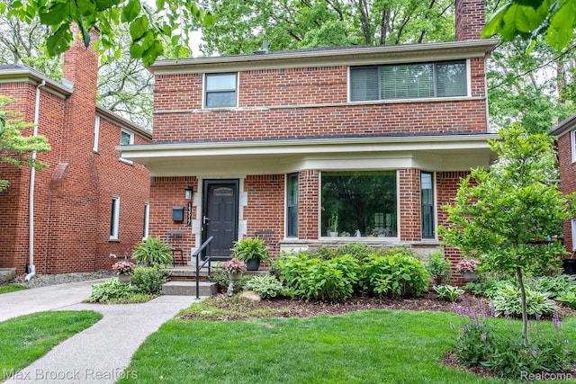 13317 Victoria Ave, Huntington Woods, MI 48070 - american foursquare style home with brick siding and a front lawn